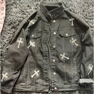 Waimea cross studded ripped black denim jacket.